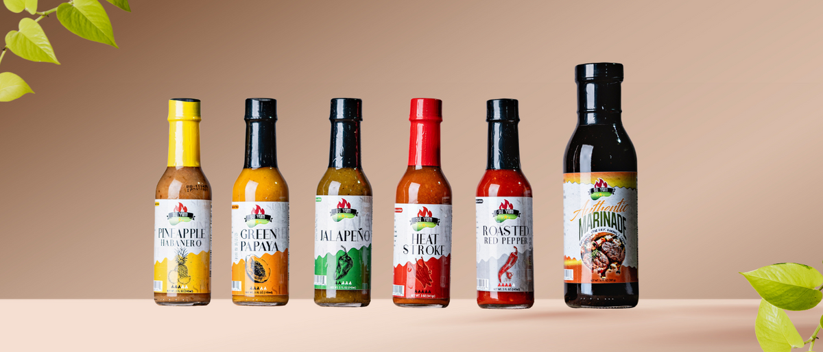 Bottles of Su Yum Surinamese hot sauces with tropical ingredients